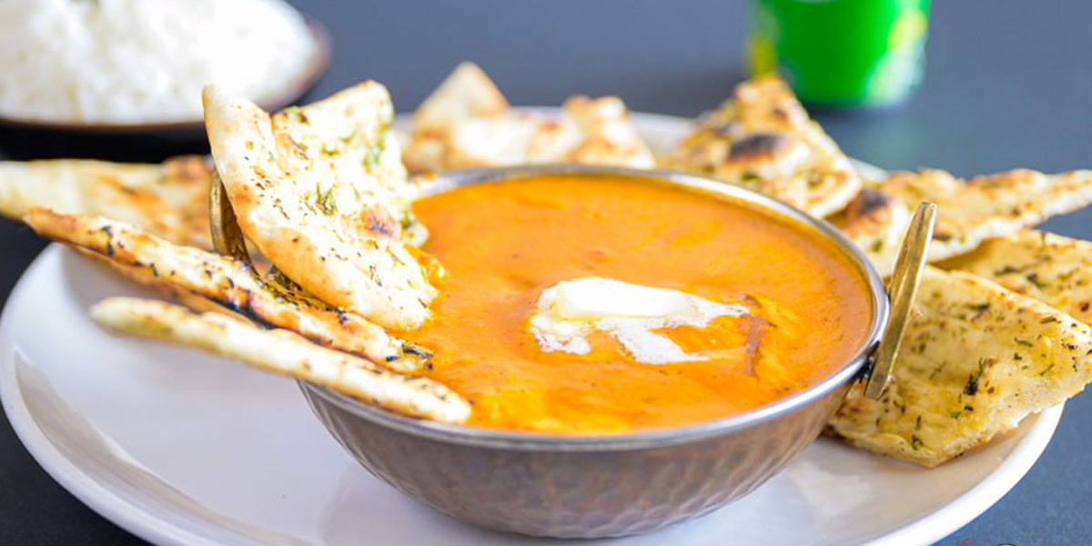Naan and Spicy Indian Curry - Athidhi Indian
